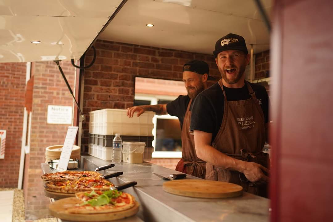 Chris and the team laughing mid-service at the Nag Box hatch